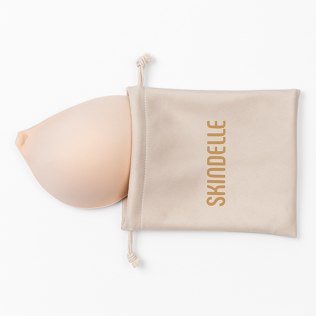 Skindelle Adhesive bra bra with a matching drawstring bag on a white background